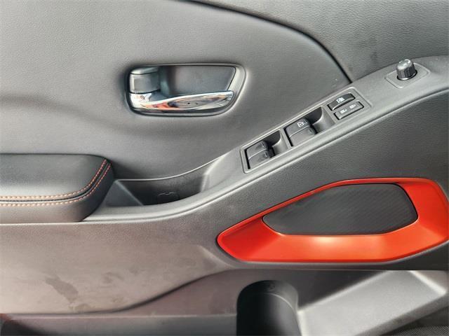 Photo of 2025 Afterburn Orange Nissan Frontier