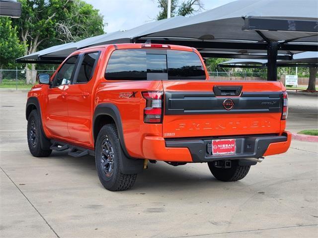 Photo of 2025 Afterburn Orange Nissan Frontier