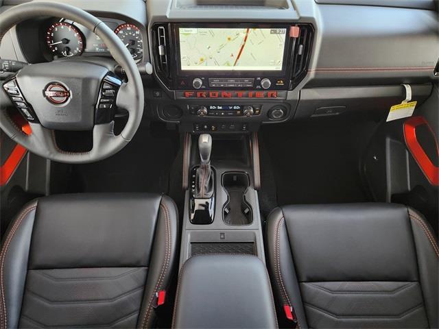 Photo of 2025 Afterburn Orange Nissan Frontier