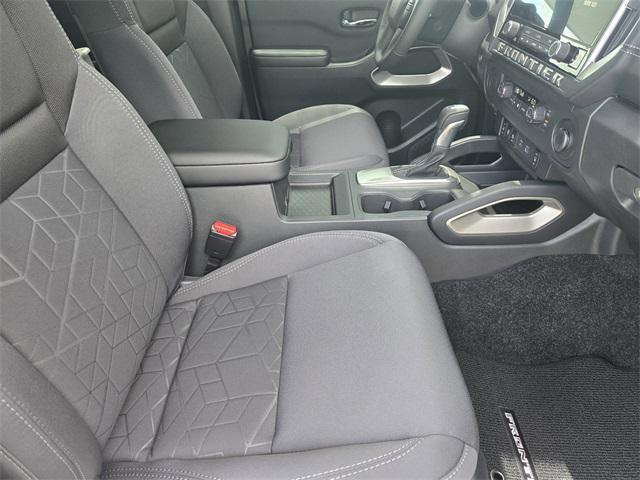 Photo of 2025 Glacier White Nissan Frontier