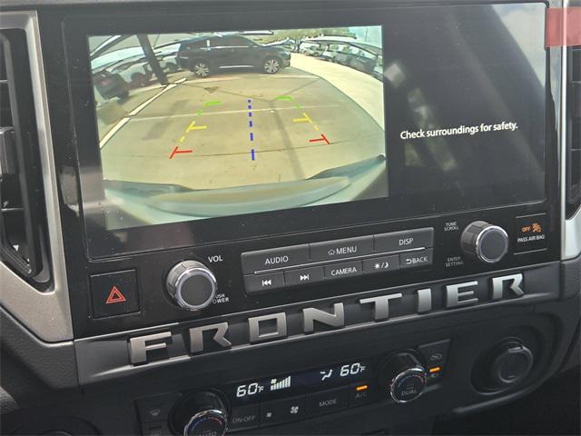 Photo of 2025 Glacier White Nissan Frontier