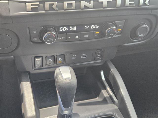 Photo of 2025 Glacier White Nissan Frontier