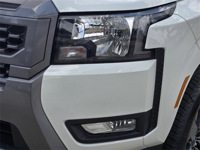 Photo of 2025 Glacier White Nissan Frontier