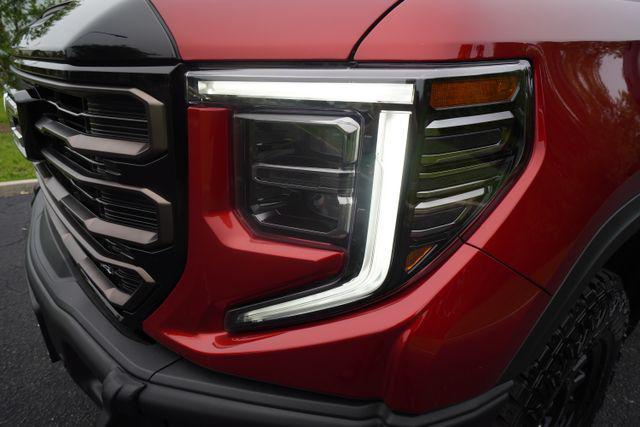 Photo of 2025 Volcanic Red Tintcoat GMC Sierra 1500