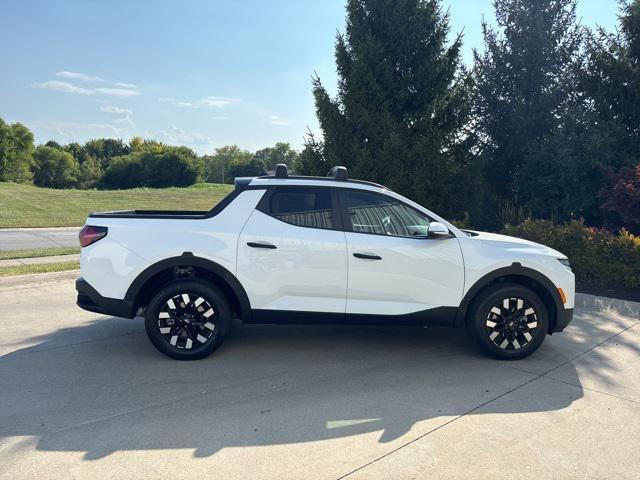 Photo of 2026 Atlas White Hyundai SANTA CRUZ