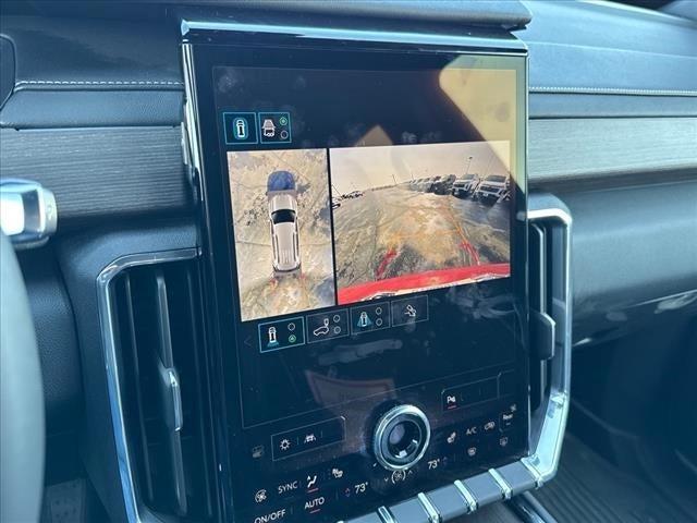 Photo of 2024 Volcanic Red GMC Acadia