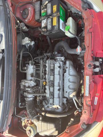 Photo of 2002 Red Suzuki Aerio