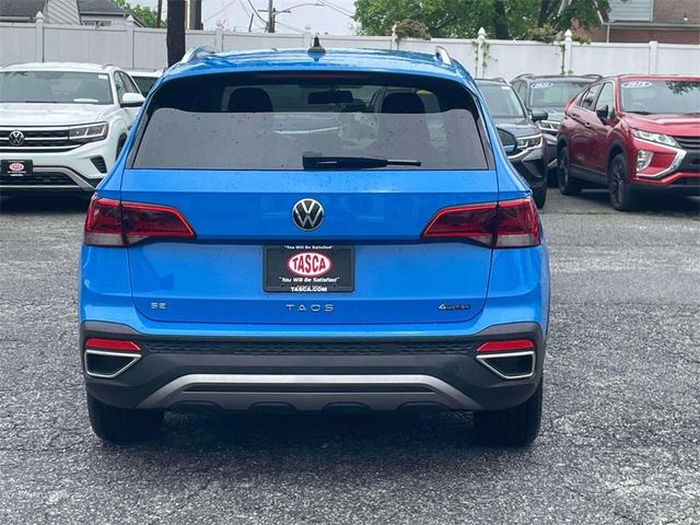 Photo of 2022 Cornflower Blue Volkswagen Taos