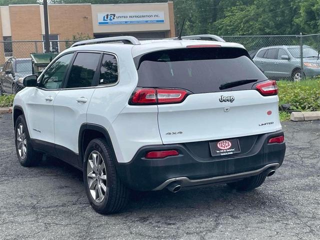 Photo of 2014 Bright White Clearcoat Jeep Cherokee