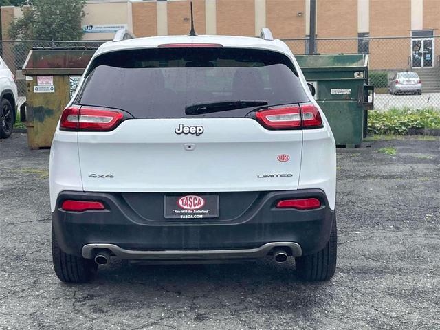 Photo of 2014 Bright White Clearcoat Jeep Cherokee