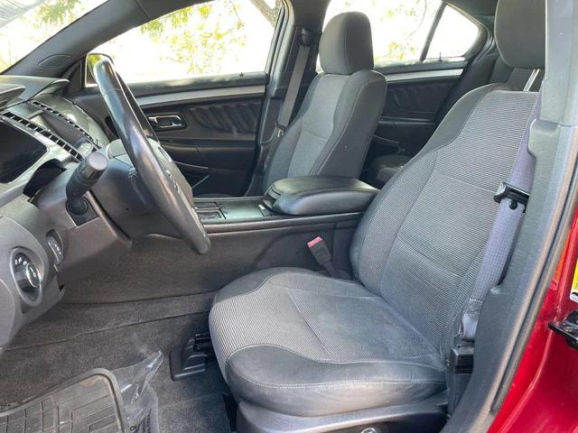 Photo of 2013 Ruby Red Metallic Tinted Clearcoat Ford Taurus