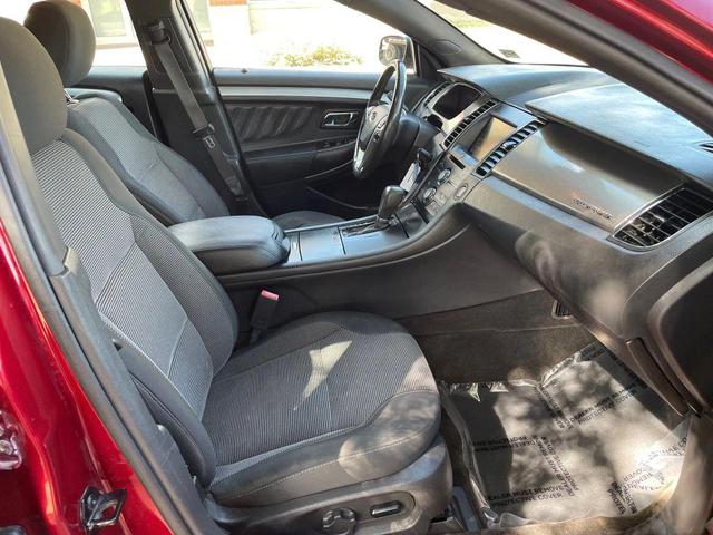 Photo of 2013 Ruby Red Metallic Tinted Clearcoat Ford Taurus