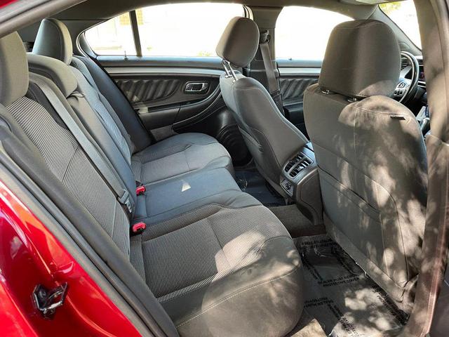 Photo of 2013 Ruby Red Metallic Tinted Clearcoat Ford Taurus