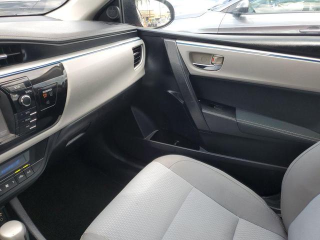 Photo of 2016 Barcelona Red Metallic Toyota Corolla