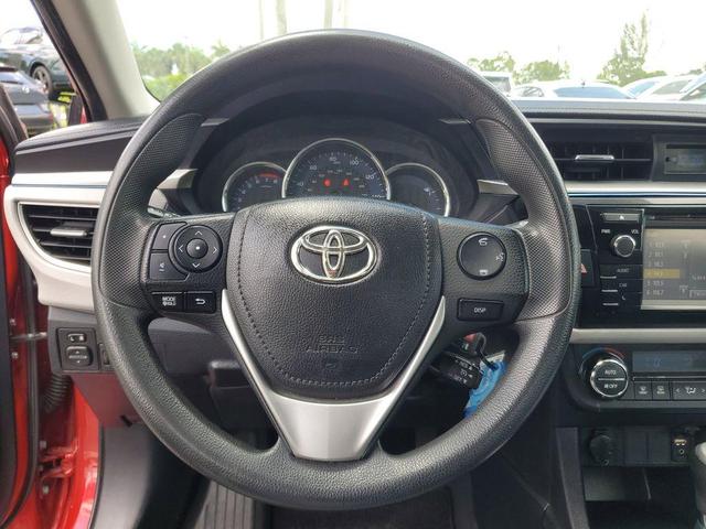 Photo of 2016 Barcelona Red Metallic Toyota Corolla