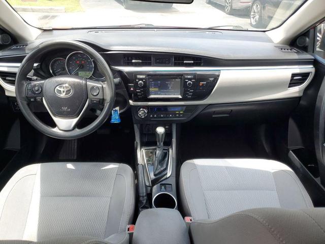 Photo of 2016 Barcelona Red Metallic Toyota Corolla