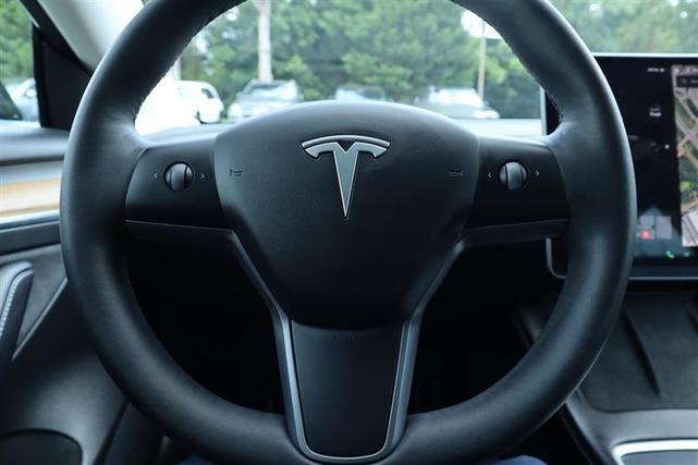Photo of 2021 Black Tesla Model 3