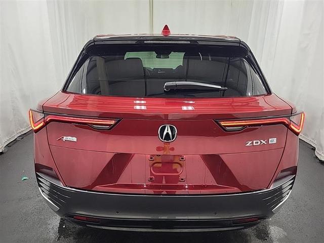 Photo of 2024 Scarlet Red Metallic Acura ZDX