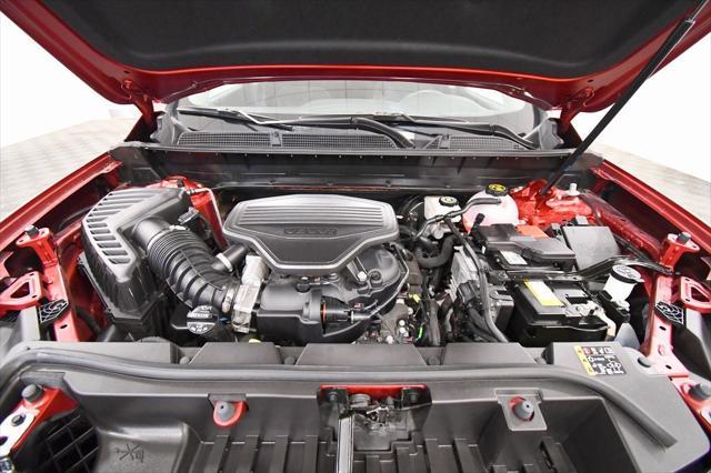 Photo of 2023 Volcanic Red Tintcoat GMC Acadia