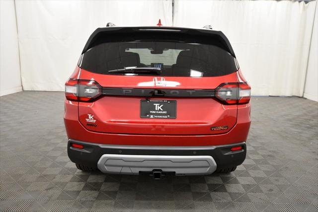 Photo of 2025 Radiant Red Metallic II Honda Pilot