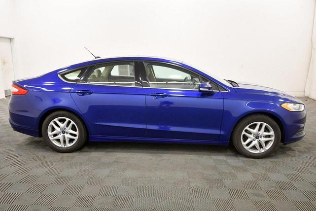Photo of 2014 Blue Metallic Ford Fusion