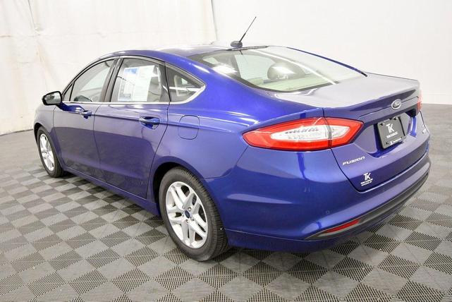 Photo of 2014 Blue Metallic Ford Fusion