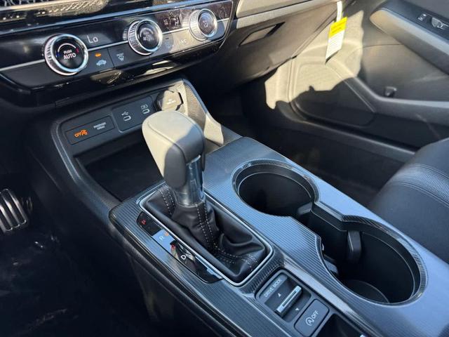 Photo of 2025 Blue Lagoon Pearl Honda Civic Hybrid