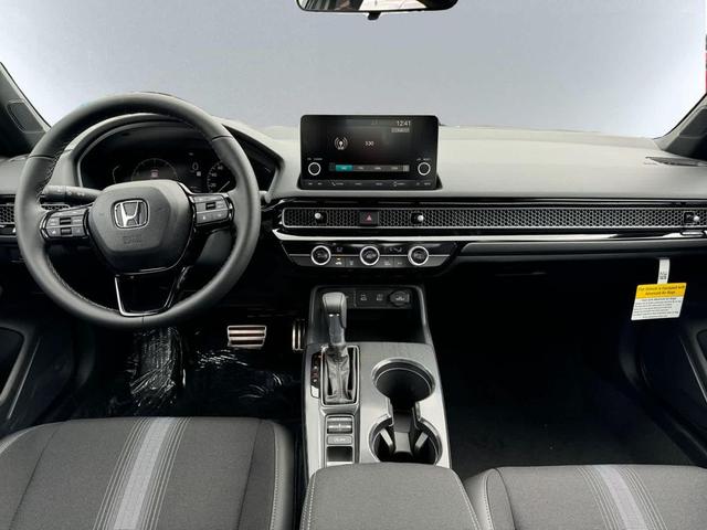 Photo of 2025 Blue Lagoon Pearl Honda Civic Hybrid