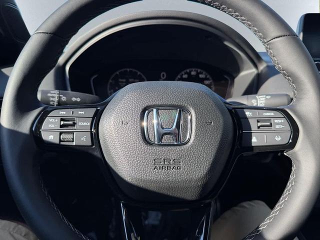 Photo of 2025 Blue Lagoon Pearl Honda Civic Hybrid