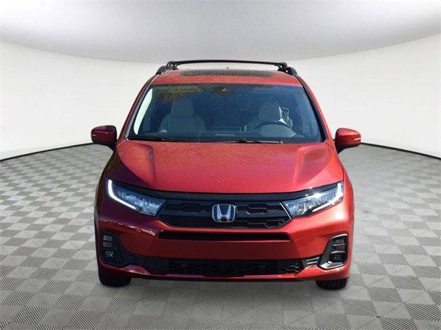Photo of 2025 Radiant Red Metallic Honda Odyssey