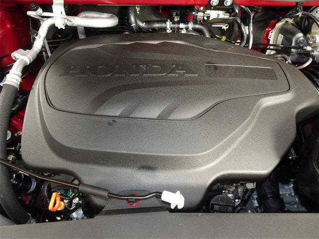 Photo of 2025 Radiant Red Metallic Honda Odyssey