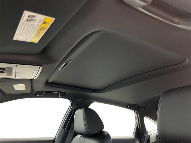 Photo of 2025 Urban Gray Pearl Honda Civic Hybrid