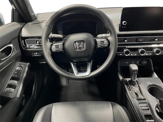 Photo of 2025 Blue Lagoon Honda Civic Hybrid