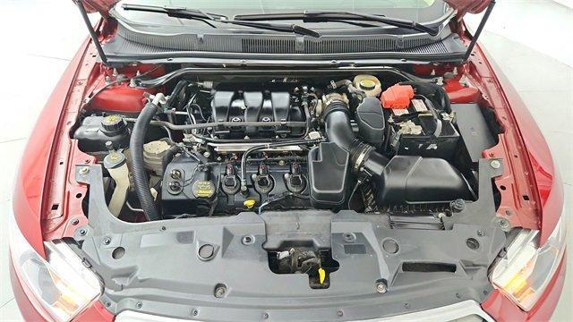 Photo of 2013 Ruby Red Metallic Ford Taurus