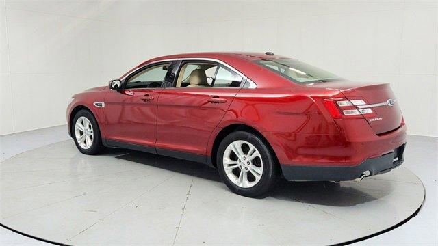 Photo of 2013 Ruby Red Metallic Ford Taurus