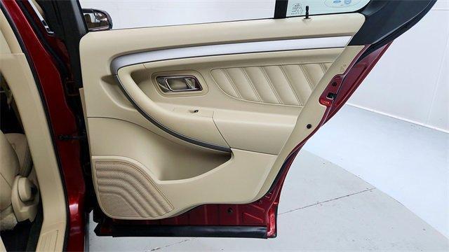 Photo of 2013 Ruby Red Metallic Ford Taurus