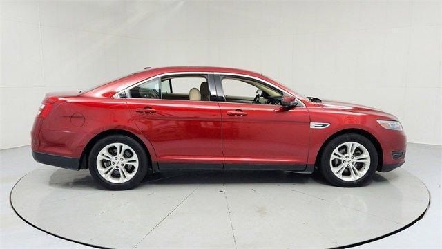 Photo of 2013 Ruby Red Metallic Ford Taurus