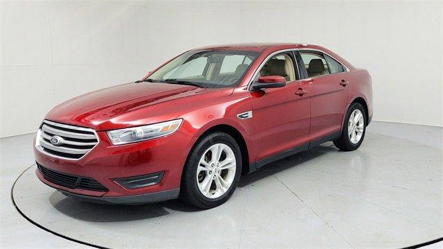 Photo of 2013 Ruby Red Metallic Ford Taurus