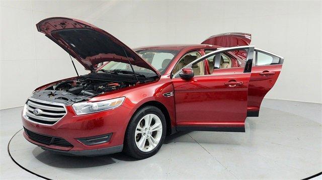 Photo of 2013 Ruby Red Metallic Ford Taurus