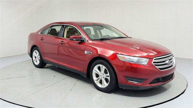Photo of 2013 Ruby Red Metallic Ford Taurus
