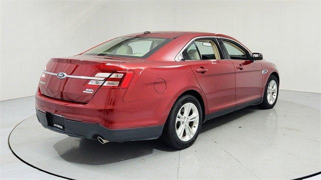 Photo of 2013 Ruby Red Metallic Ford Taurus
