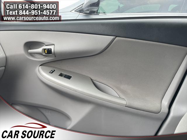 Photo of 2012 Black Sand Pearl Toyota Corolla
