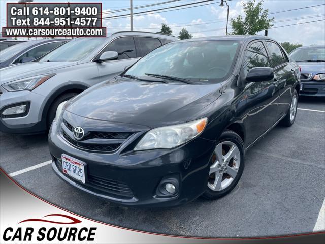 Photo of 2012 Black Sand Pearl Toyota Corolla