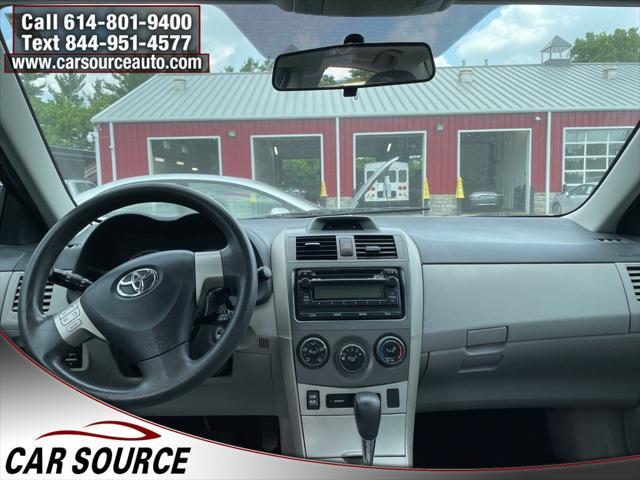Photo of 2012 Black Sand Pearl Toyota Corolla