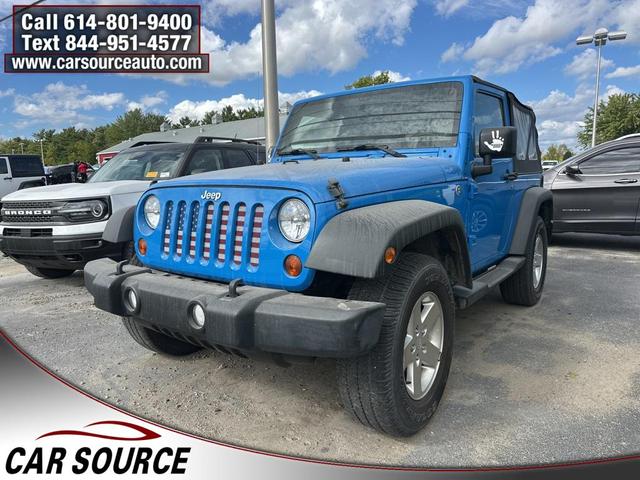 Photo of 2011 Cosmos Blue Jeep Wrangler