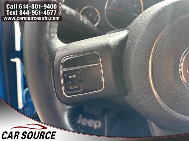 Photo of 2011 Cosmos Blue Jeep Wrangler