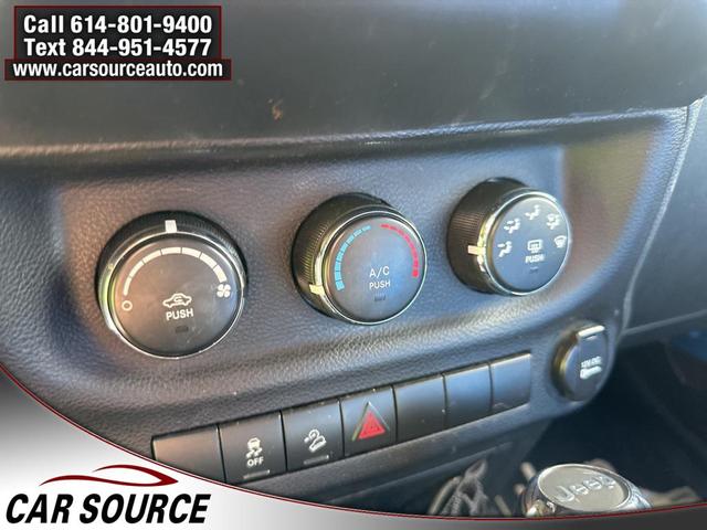 Photo of 2011 Cosmos Blue Jeep Wrangler