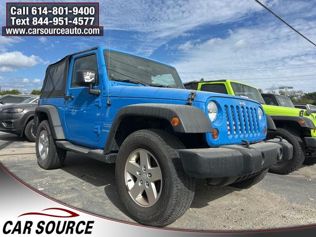 Photo of 2011 Cosmos Blue Jeep Wrangler