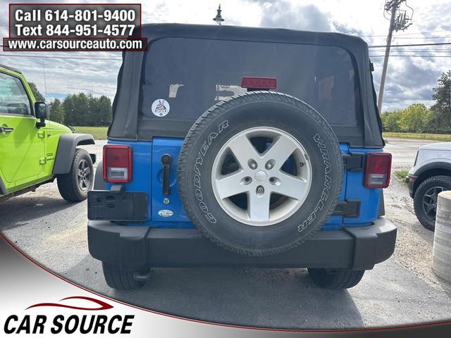 Photo of 2011 Cosmos Blue Jeep Wrangler