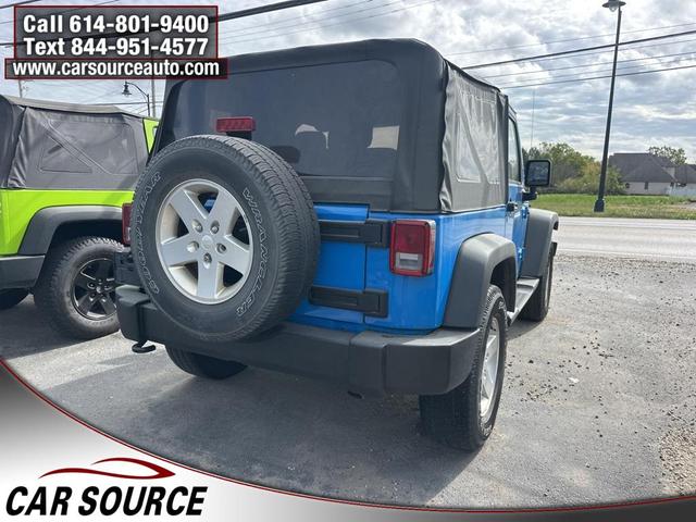 Photo of 2011 Cosmos Blue Jeep Wrangler